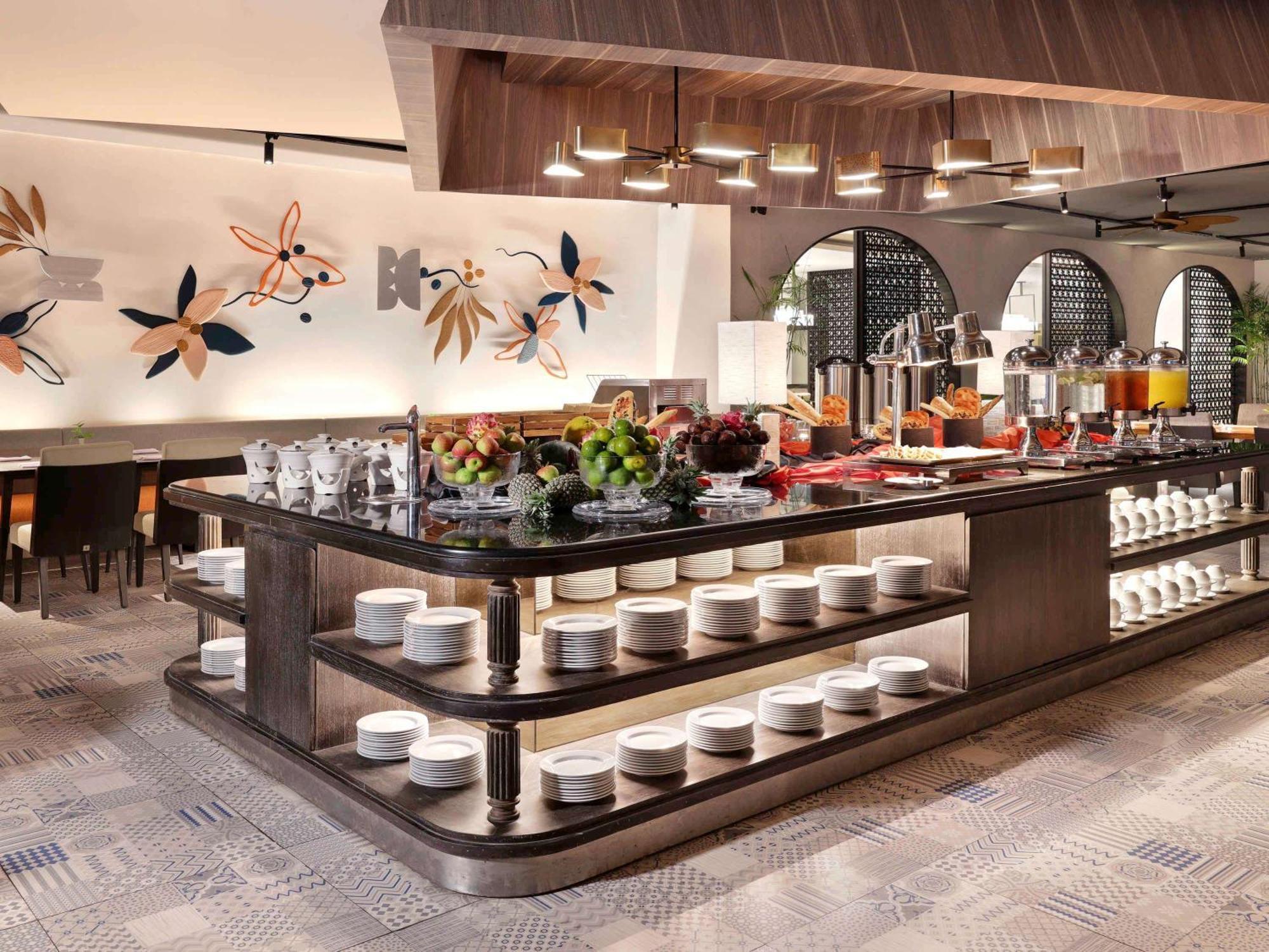 Grand Mercure Bali Seminyak Exterior photo The buffet at the restaurant