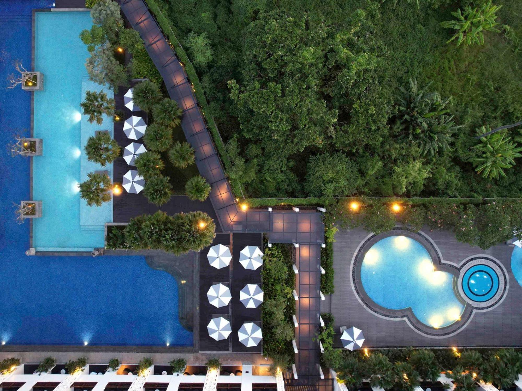 Grand Mercure Bali Seminyak Exterior photo Aerial view of the pool
